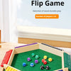 A six-sided number flip game made of wood with dice, set for 2 to 6 players.