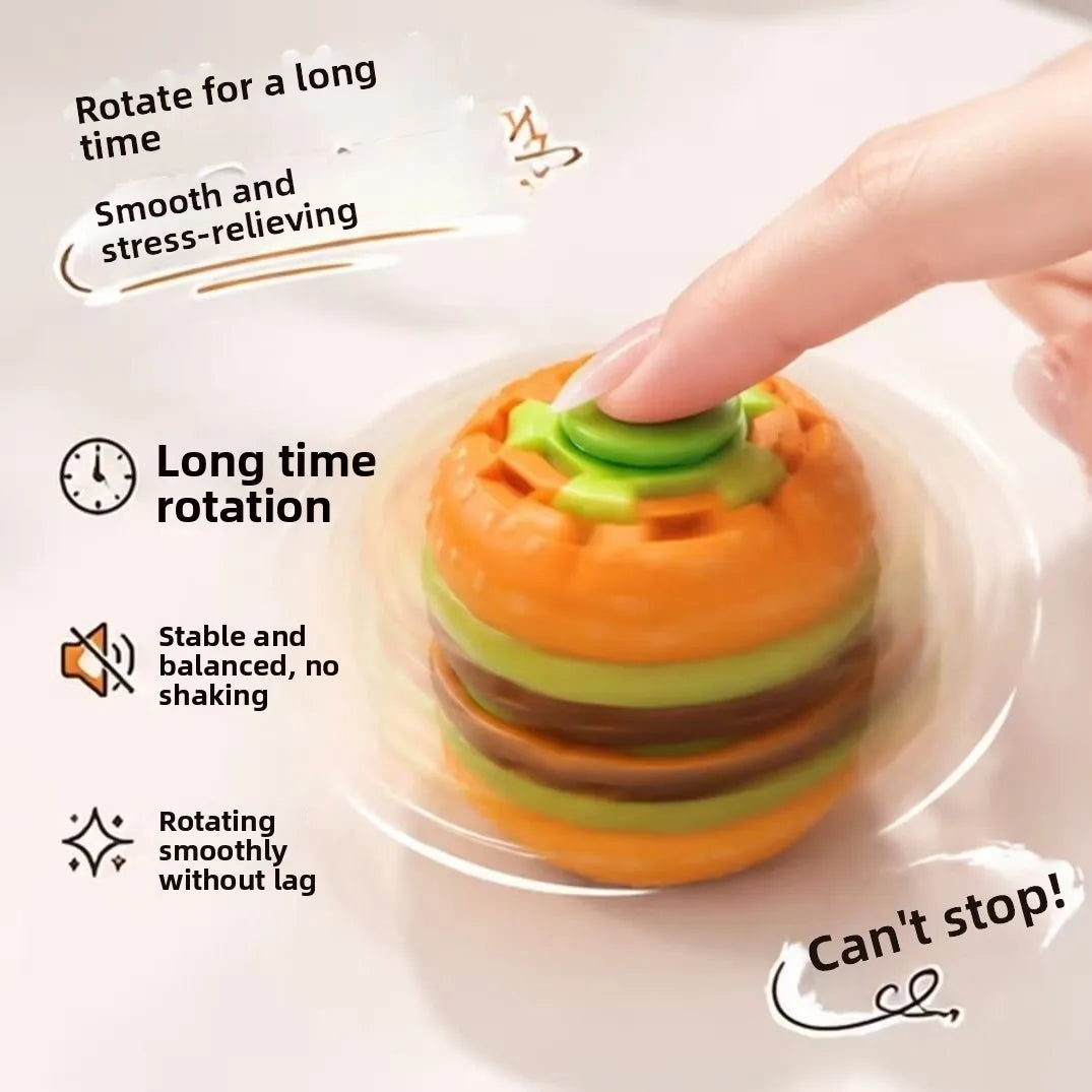 A hand rotates an orange burger-shaped silicone spinner toy for stress relief and long time rotation.