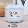 A ball of light blue 100% cotton yarn labeled as Cotton Yarn, measuring 15 cm.