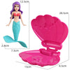 A pink mermaid bath toy featuring a purple mermaid figure and a large, fluted pink shell.
