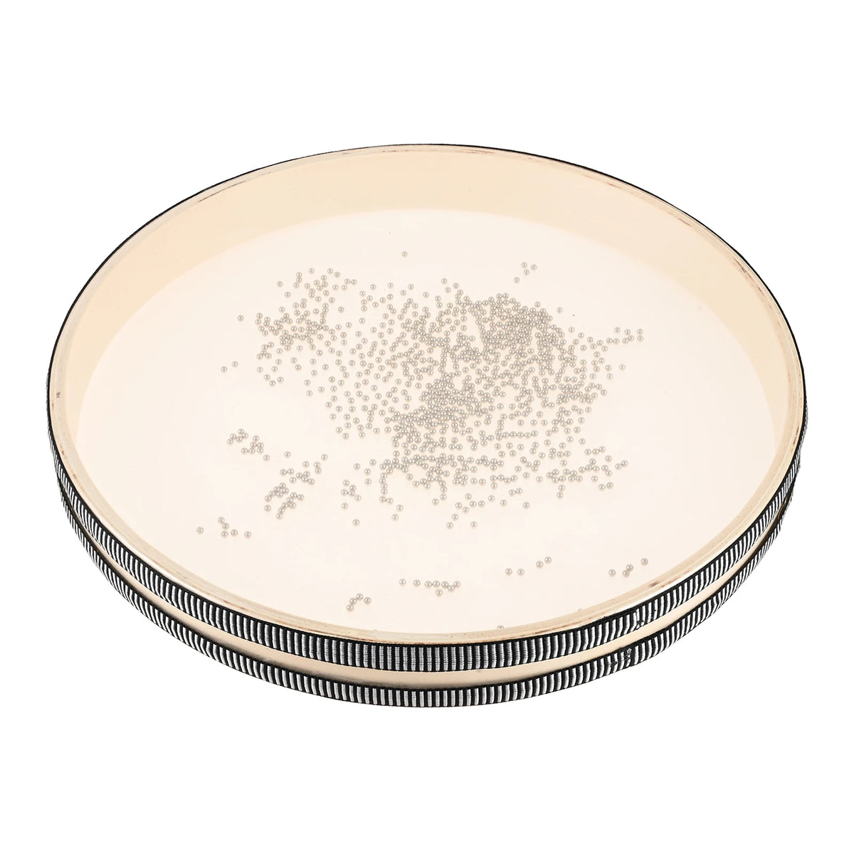 A light beige 12-inch ocean drum with a hardwood shell and striped carry bag.