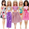 A set of five handmade casual doll outfits for 1/6 scale dolls featuring various colors and styles.