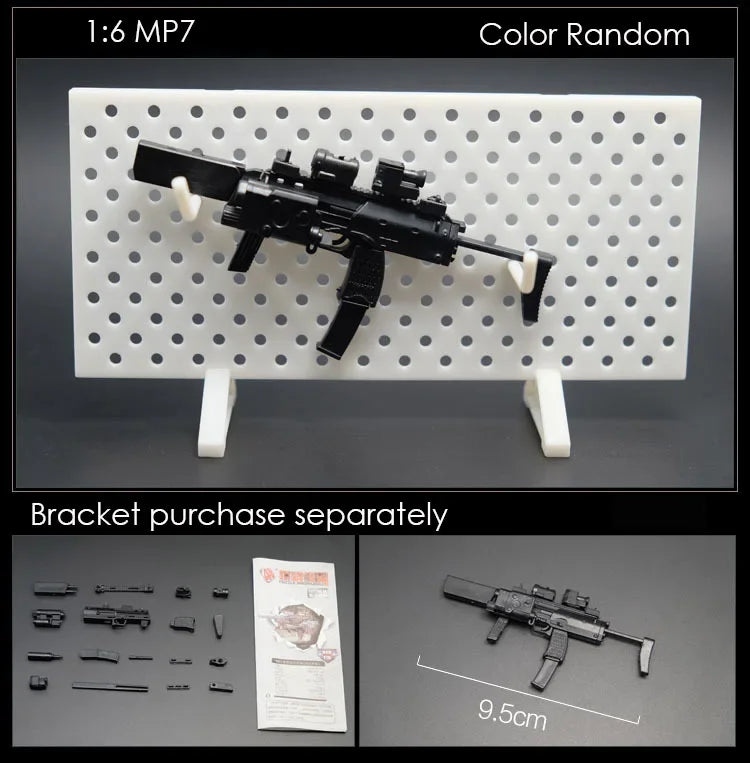 A black 1:6 scale military submachine gun model kit is displayed on a white grid, with separate brackets and scale reference.