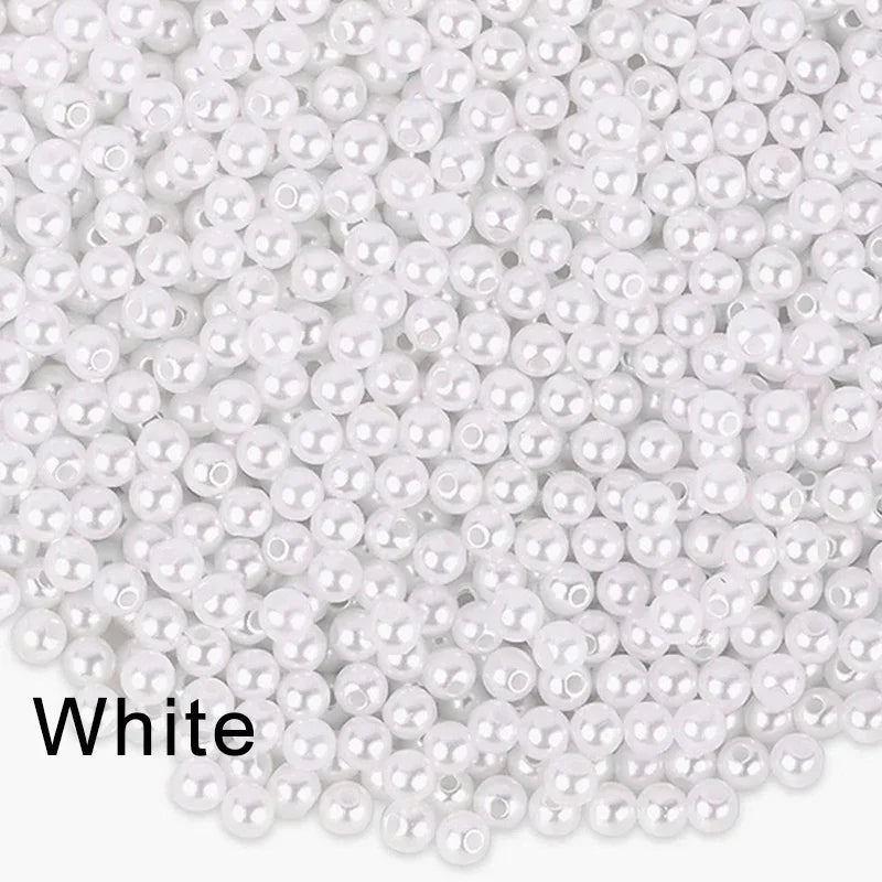 A pile of small white ivory pearl beads for DIY jewelry making