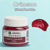 A bottle of Crimson fabric colour paint, 50ml per bottle, with a swatch of the red liquid next to it.