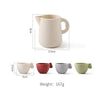 A set of wooden pretend play tea party cups in various sizes and colors.