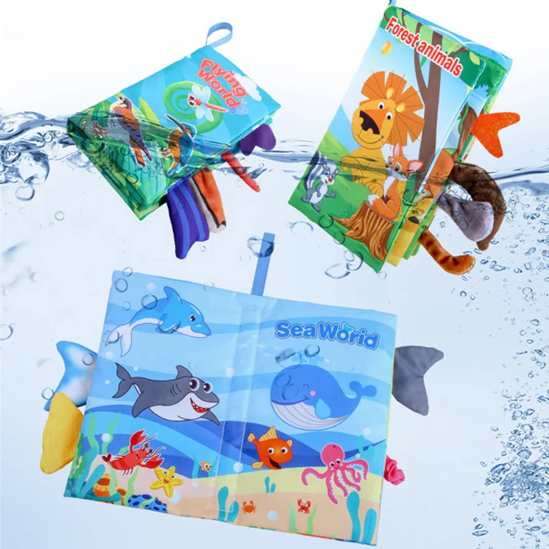 A collection of soft fabric baby books featuring animals like lions, birds, and sea creatures.