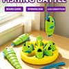 A yellow board game featuring green spinning fishing disks and elongated green fish toys.