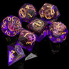 A collection of purple sharp edge resin dice showing various numbers and symbols used for tabletop role-playing games