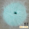 Light turquoise blue long-haired alpaca blend yarn in a ball for knitting