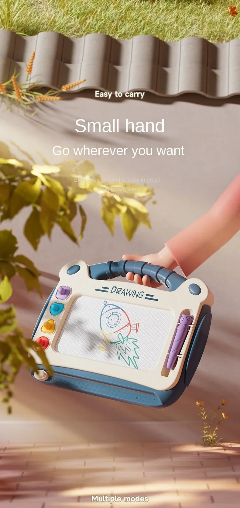A small, blue magnetic drawing board is held by a hand, showing various drawing tools and a colorful sketch.