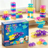 A box of Magic Gummy Block building blocks in various colors and shapes displayed on a wooden surface.