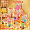 A multi-story pink and white miniature castle and villa playset with light belt features and dolls