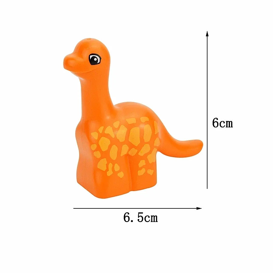 An orange plastic zoo animal building block with a large eye and spotted skin, shown next to a measurement scale.