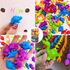 A colorful set of dinosaur toys in various colors like blue, purple, green, and red are shown for counting and sorting.