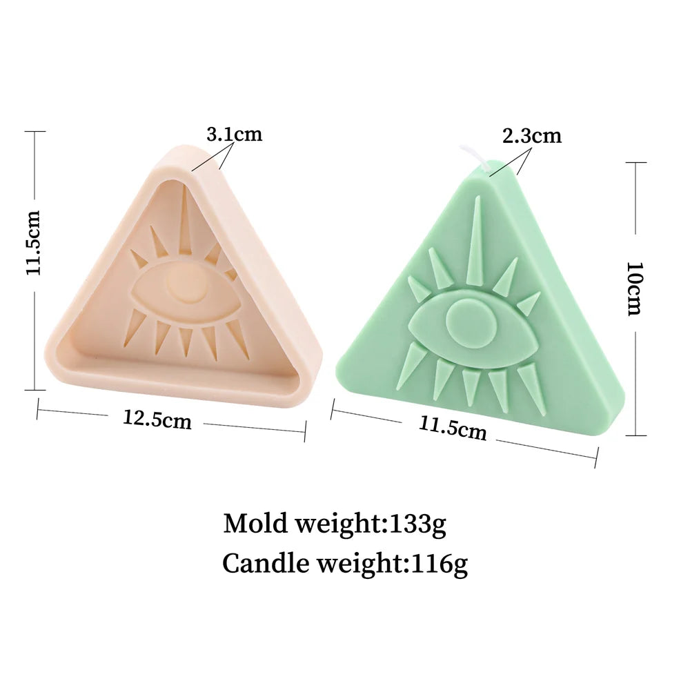 A light pink silicone mold shaped like an evil eye for making candles, soap, or resin art.