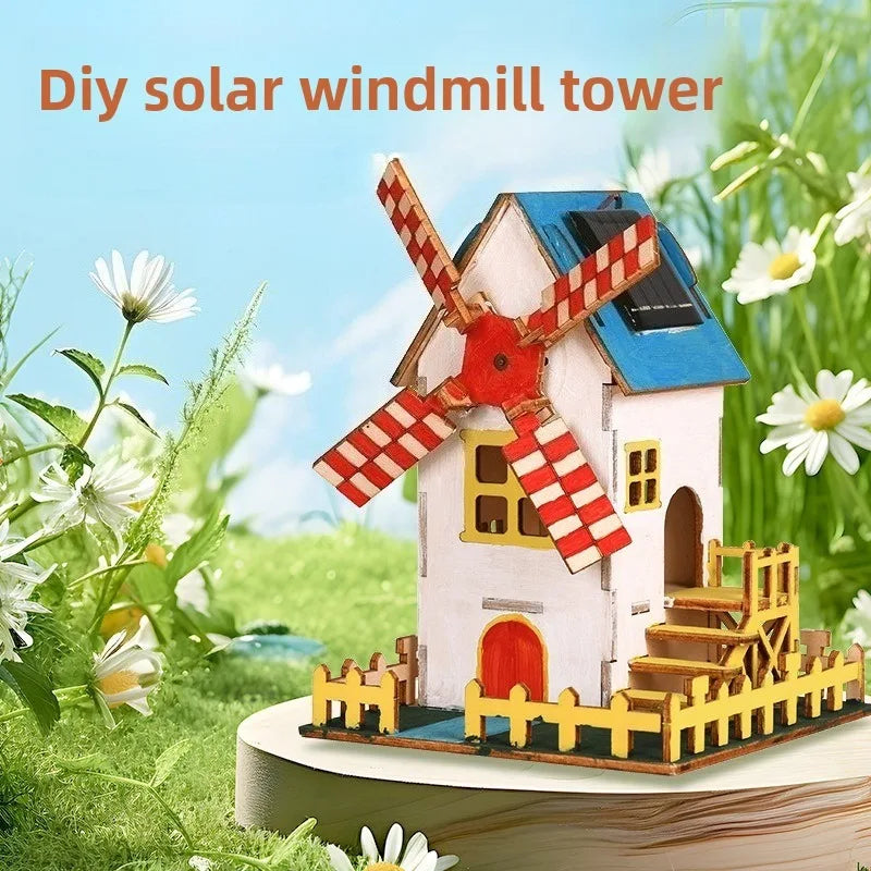 A wooden model kit of a solar-powered lunar rover featuring a house and fence in a garden setting.