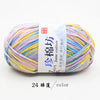 A ball of pink and yellow yarn labeled as Jim Jane cotton yarn for knitting and crochet