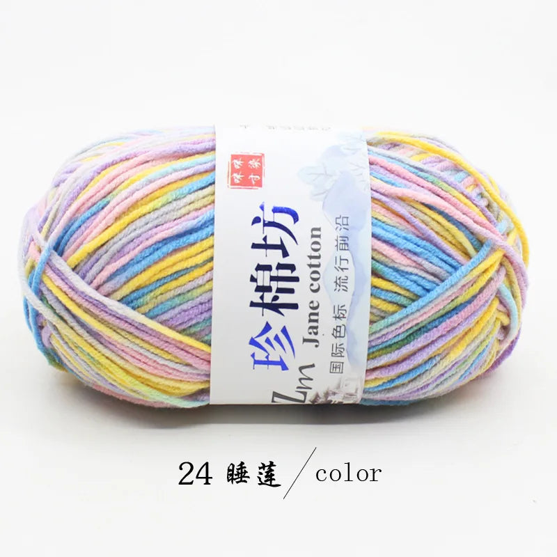 A ball of pink and yellow yarn labeled as Jim Jane cotton yarn for knitting and crochet