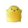 A yellow glitter slow-rising dumpling stress ball with a steamer base.