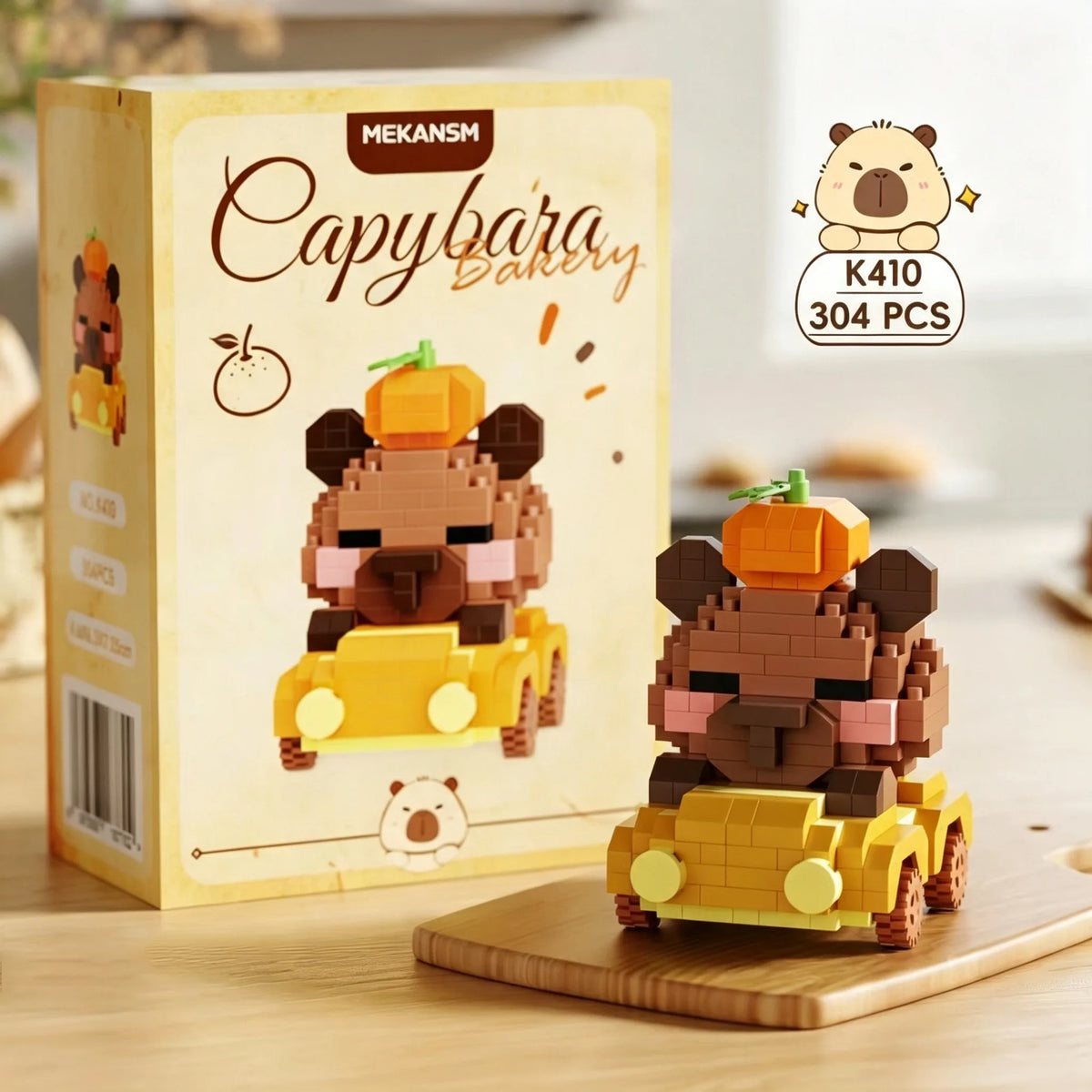 A box of K410 Capybara Bakery micro building blocks featuring a bear and a yellow car.