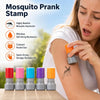 A woman applies a mosquito prank stamp to her arm, demonstrating the self-inking mechanism and realistic impression.
