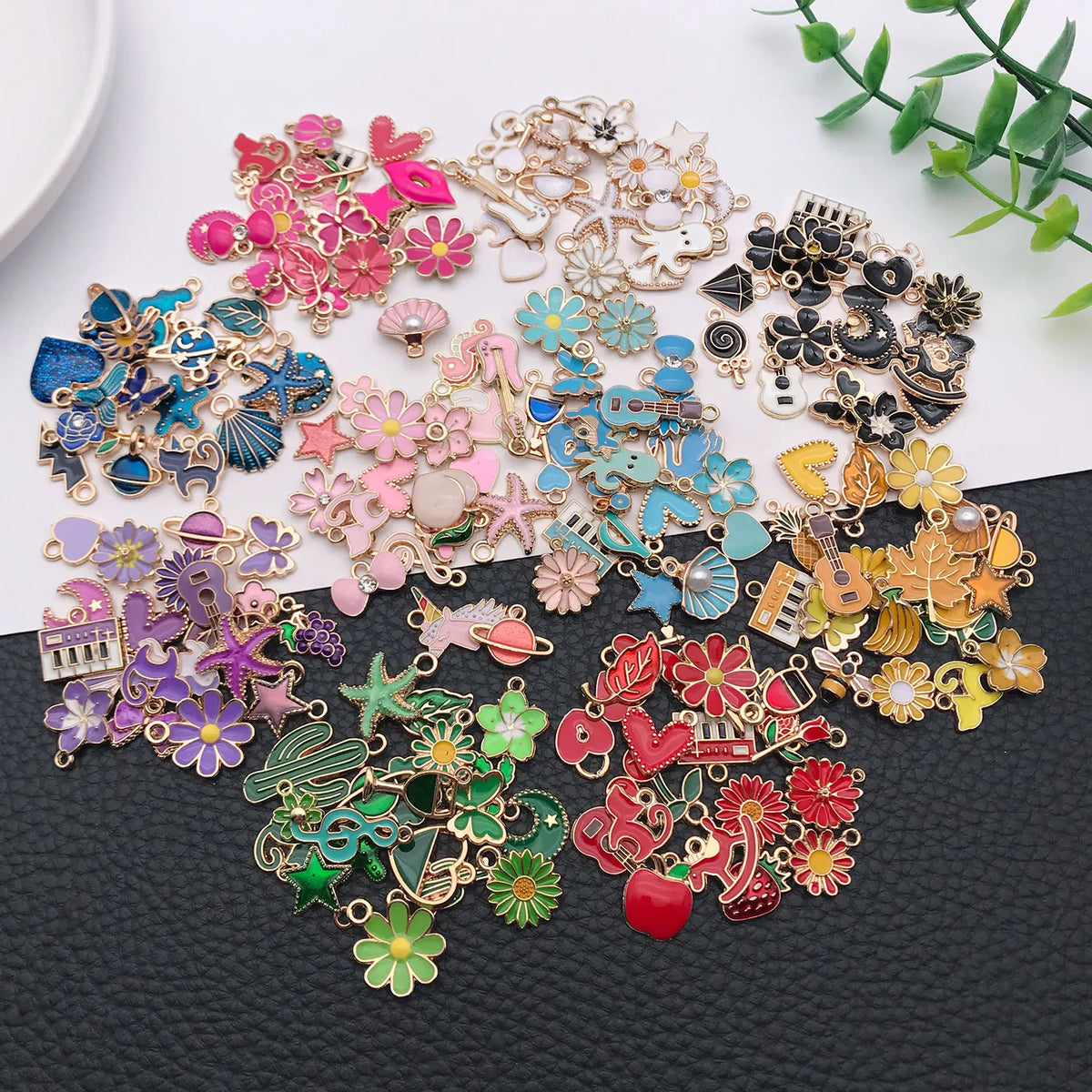 A collection of colorful enamel alloy flower charms and decorative elements for DIY jewelry making