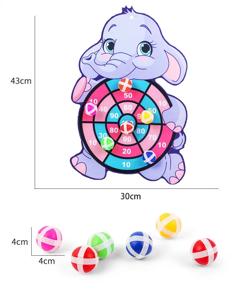 A purple elephant shaped dart board with colored sticky balls and a set of various colored dart balls.