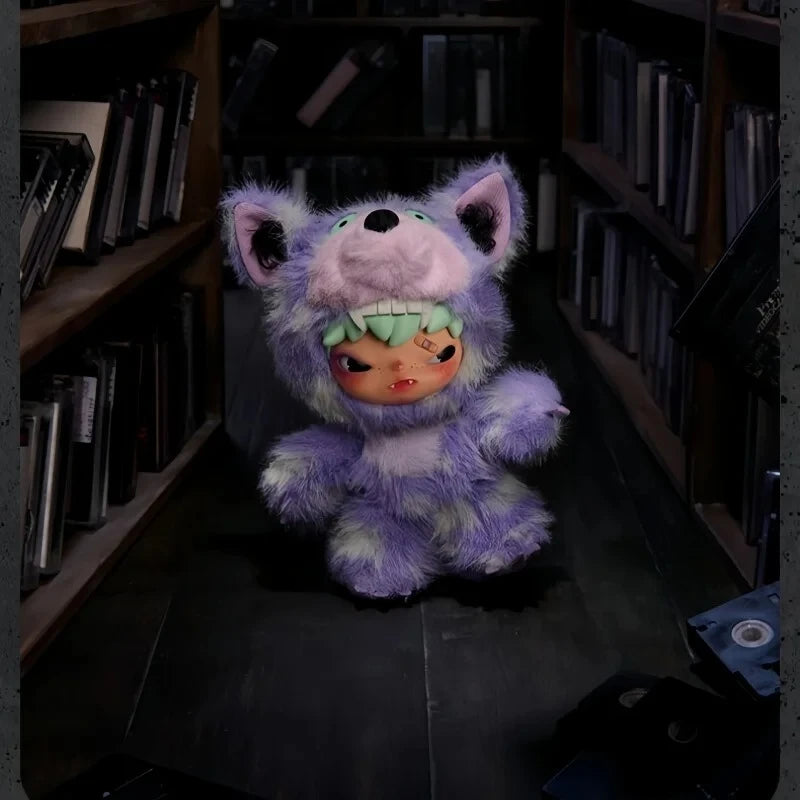 A purple and white fluffy fox plush doll with green accents displayed on a dark wooden shelf.