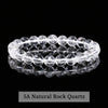 A close-up of a stretch bracelet made from 5A Natural Rock Quartz beads.