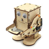 A wooden paddle boat kit made of light-colored wood and components for a DIY science project.