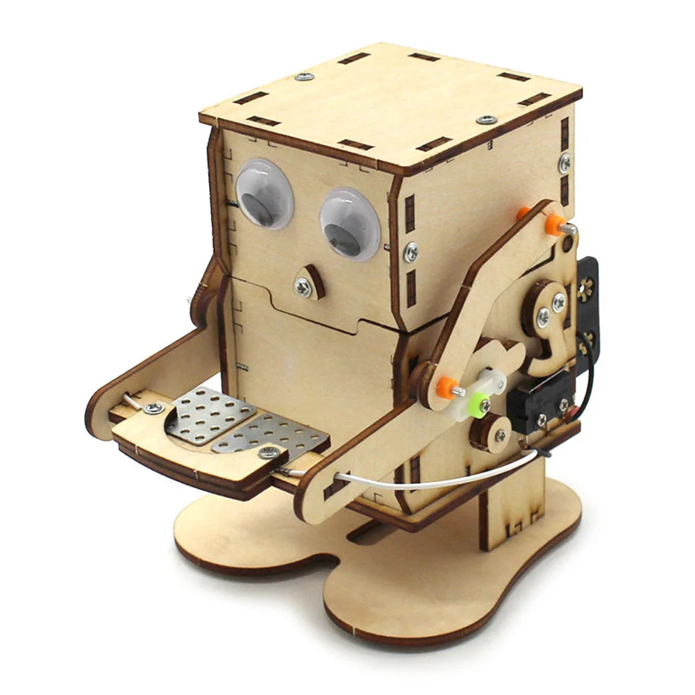 A wooden paddle boat kit made of light-colored wood and components for a DIY science project.