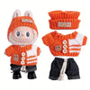 An adorable doll sweater outfit set featuring orange and white striped knitted clothing for a 17cm figure.
