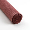 A roll of reddish-brown crepe paper for DIY crafts and gift wrapping.