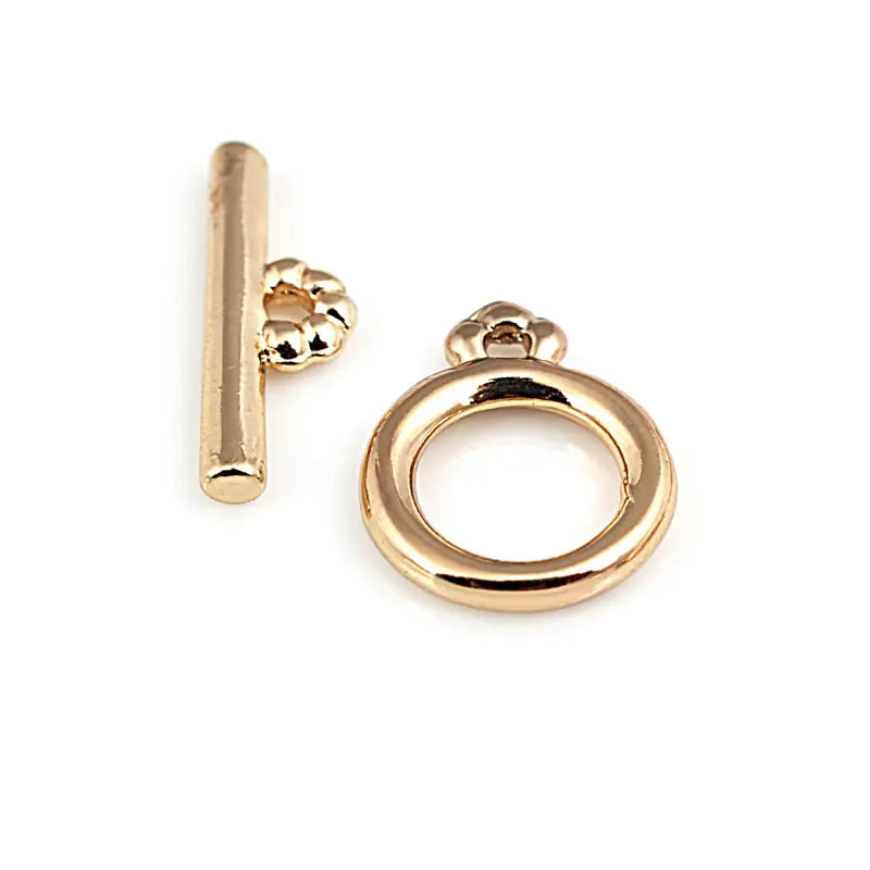 A pair of 18K gold round O-toggle clasps for bracelets and jewelry making, shown against a white background.