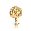 A gold-toned charm bracelet featuring pendants of an elephant, key, butterfly, and heart.