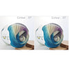 A ball of hand-dyed rainbow merino wool yarn in shades of blue, green, and purple, shown from the side.