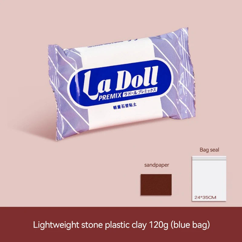 A purple and white bag of La Doll premix lightweight stone plastic clay 120g in a blue bag.