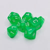 A collection of ten green acrylic polyhedral dice scattered on a white surface.