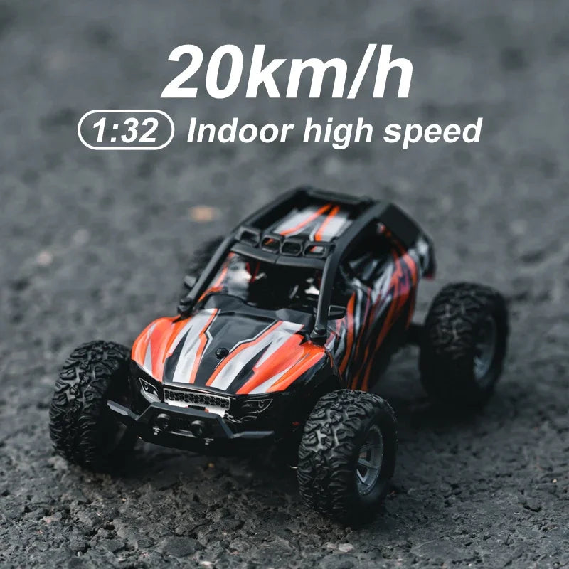 Black and orange 1:32 scale RC off-road car in high speed performance test.