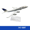 Diecast model of a Kuwait Airways Boeing airplane in white and blue livery.