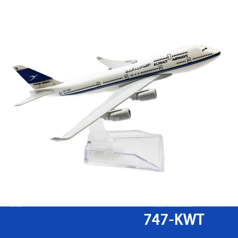 Diecast model of a Kuwait Airways Boeing airplane in white and blue livery.