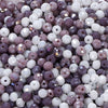 Mixed color faceted rondelle glass beads in shades of purple and white for jewelry making