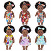 A set of four 12-inch realistic African American baby dolls wearing colorful floral outfits.