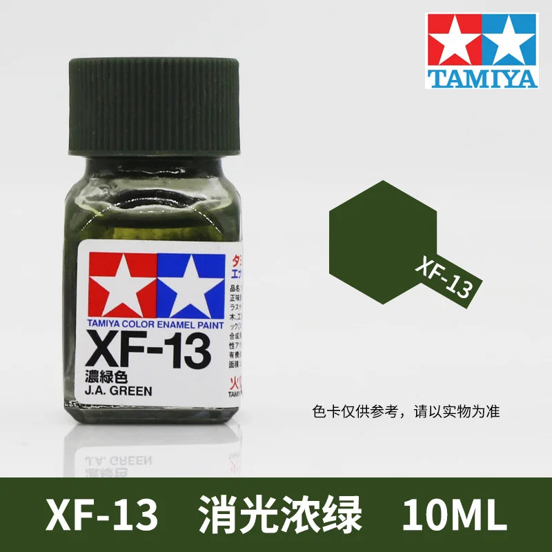 Tamiya XF-13 gloss black enamel paint in a glass bottle with a green label