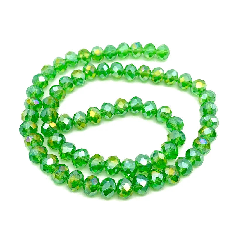 Green faceted crystal beads strung together for jewelry making