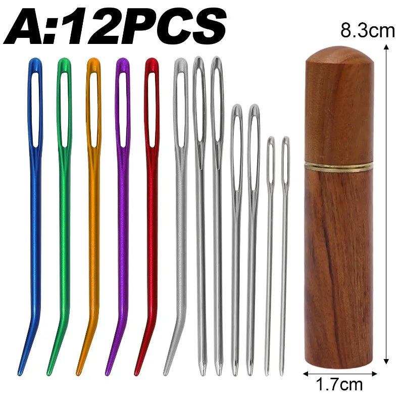 A set of 12 stainless steel sewing needles in various colors stored in a wooden tube.