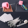 A set of pre-waxed cotton candle wicks with metal sustainers and a pink wax container.