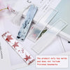 A set of flexible silicone molds for creating resin bookmarks, including floral and abstract designs.