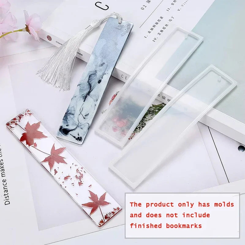 A set of flexible silicone molds for creating resin bookmarks, including floral and abstract designs.